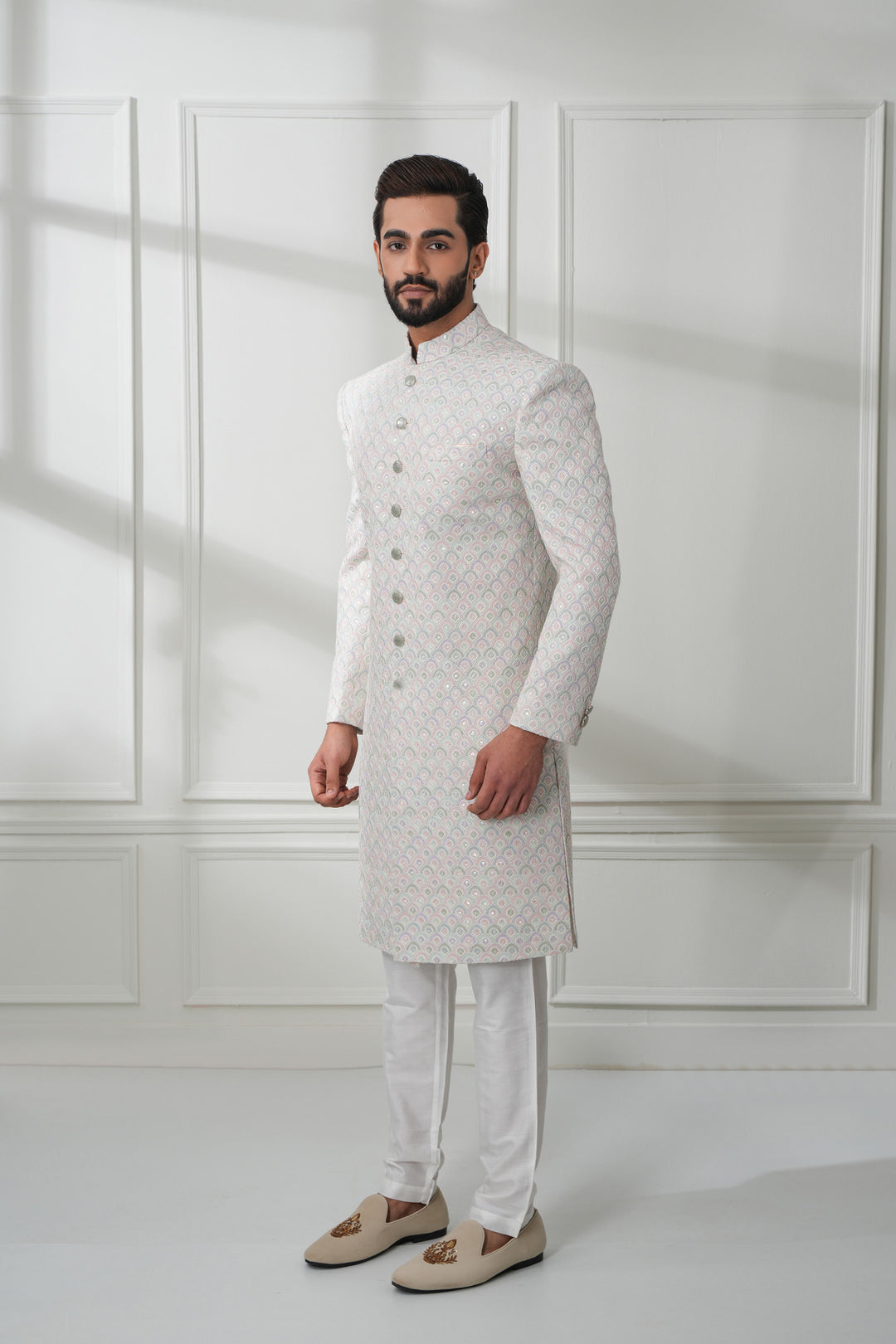 Featuring A White Sherwani In Chikankari Base With Embroidery